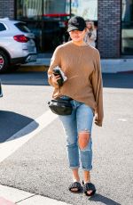 CHRISSY TEIGEN in Ripped Denim Out in West Hollywood 02/16/2022