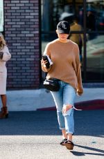CHRISSY TEIGEN in Ripped Denim Out in West Hollywood 02/16/2022