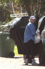 CHRISTINA PERRI Vacuums Her Car and Packs it with Luggage in Los Angeles 02/02/2022