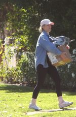CHRISTINA PERRI Vacuums Her Car and Packs it with Luggage in Los Angeles 02/02/2022