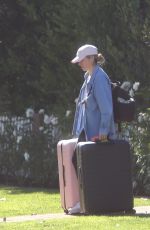 CHRISTINA PERRI Vacuums Her Car and Packs it with Luggage in Los Angeles 02/02/2022