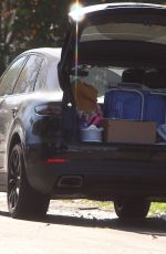 CHRISTINA PERRI Vacuums Her Car and Packs it with Luggage in Los Angeles 02/02/2022