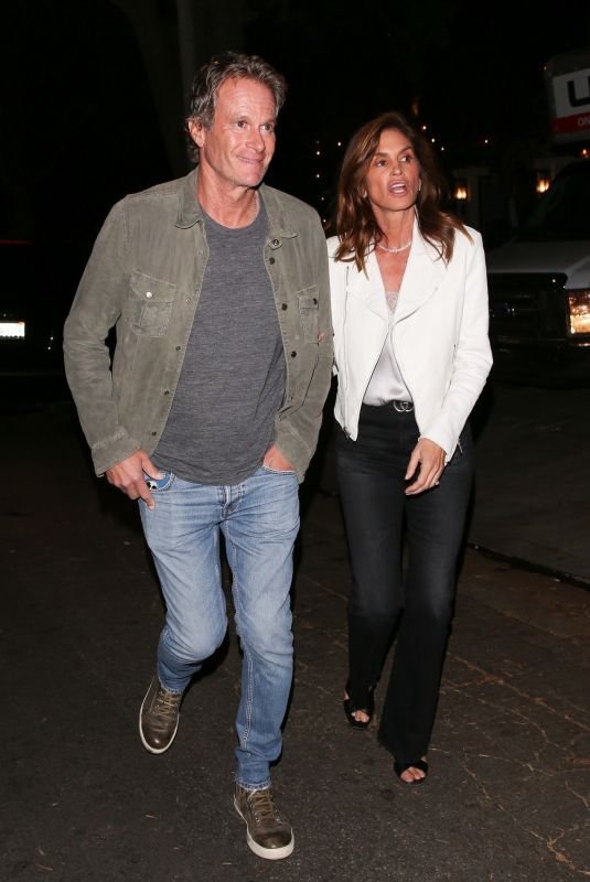 CINDY CRAWFORD and Rande Gerber Leaves Casamigos Super Bowl LVI Pre Party in Beverly Hills 02/12/2022