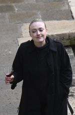 DAKOTA FANNING Enjoys a Glass of Red Wine in Venice 02/05/2022
