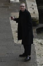 DAKOTA FANNING Enjoys a Glass of Red Wine in Venice 02/05/2022