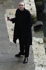 DAKOTA FANNING Enjoys a Glass of Red Wine in Venice 02/05/2022