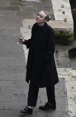 DAKOTA FANNING Enjoys a Glass of Red Wine in Venice 02/05/2022