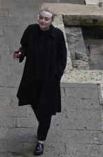 DAKOTA FANNING Enjoys a Glass of Red Wine in Venice 02/05/2022