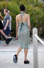 DUA LIPA in a Black Bikini Under a Sheer Cover-up Out in Miami 02/05/2022