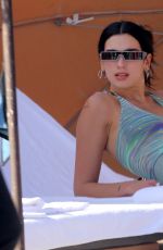 DUA LIPA in a Black Bikini Under a Sheer Cover-up Out in Miami 02/05/2022