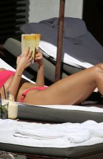 DUA LIPA in a Pink Bikini at a Pool in Miami 02/06/2022