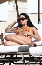 DUA LIPA in Bikini at a Pool in Miami 02/10/2022