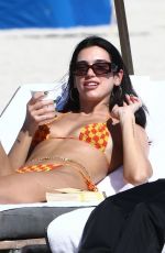 DUA LIPA in Bikini at a Pool in Miami 02/10/2022