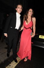 ELIZABETH HURLEY Leaves Joan Collins