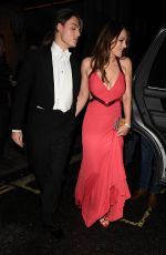 ELIZABETH HURLEY Leaves Joan Collins