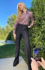 ELLE FANNING at a Gucci Photoshoot, February 2022