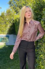 ELLE FANNING at a Gucci Photoshoot, February 2022
