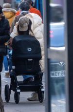 EVE Out with Her Baby in London 02/10/2022