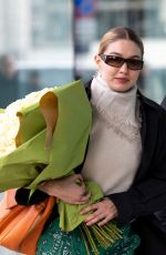 GIGI HADID Arrives at Versace Headquarters in Milan 02/24/2022