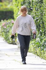 KALEY CUOCO Heading to the Set of The Flight Attendant in Los Angeles 02/15/2022
