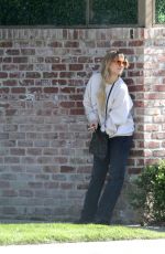 KALEY CUOCO on Smoke Break on the Set fo The Flight Attendant in Los Angeles 02/03/2022