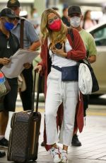 KATE HUDSON Arrives at Miami International Airport 02/24/2022