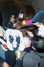 KATY PERRY Dressed as Poop Leaves El Capitan Entertainment Centre in Hollywood 02/24/2022