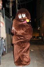 KATY PERRY Dressed as Poop Leaves El Capitan Entertainment Centre in Hollywood 02/24/2022