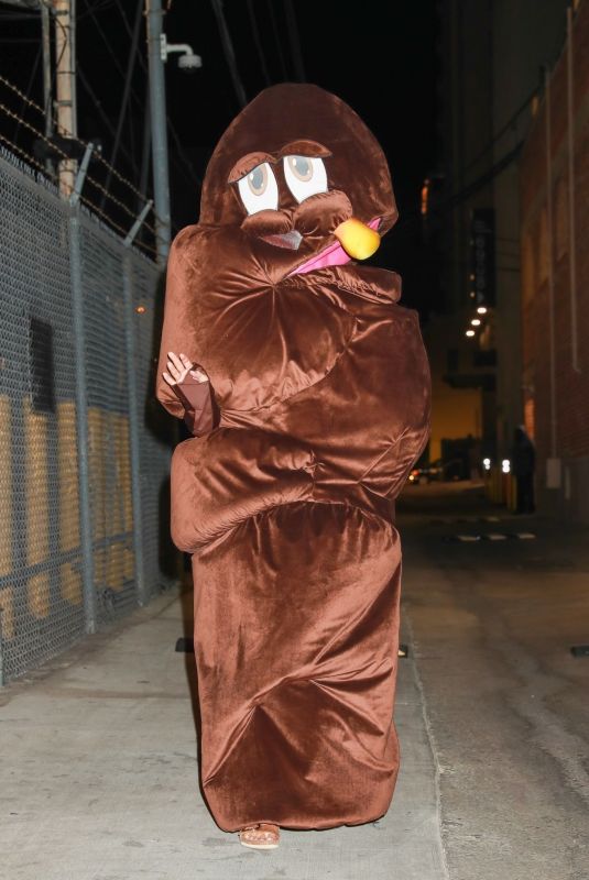 KATY PERRY Dressed as Poop Leaves El Capitan Entertainment Centre in Hollywood 02/24/2022