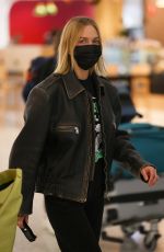 LARA BINGLE Arrives at Airport in Sydney 02/15/2022