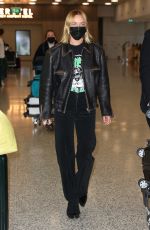 LARA BINGLE Arrives at Airport in Sydney 02/15/2022