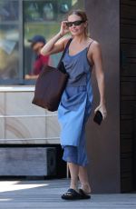 LARA BINGLE Leaves Her Hotel in Sydney 02/20/2022