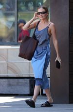 LARA BINGLE Leaves Her Hotel in Sydney 02/20/2022