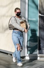 LILI REINHART in Ripped Denim Out and About in Vancouver 02/13/2022