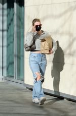 LILI REINHART in Ripped Denim Out and About in Vancouver 02/13/2022
