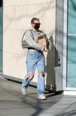 LILI REINHART in Ripped Denim Out and About in Vancouver 02/13/2022