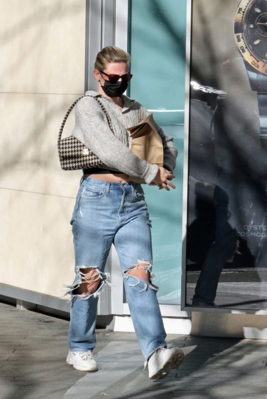 LILI REINHART in Ripped Denim Out and About in Vancouver 02/13/2022