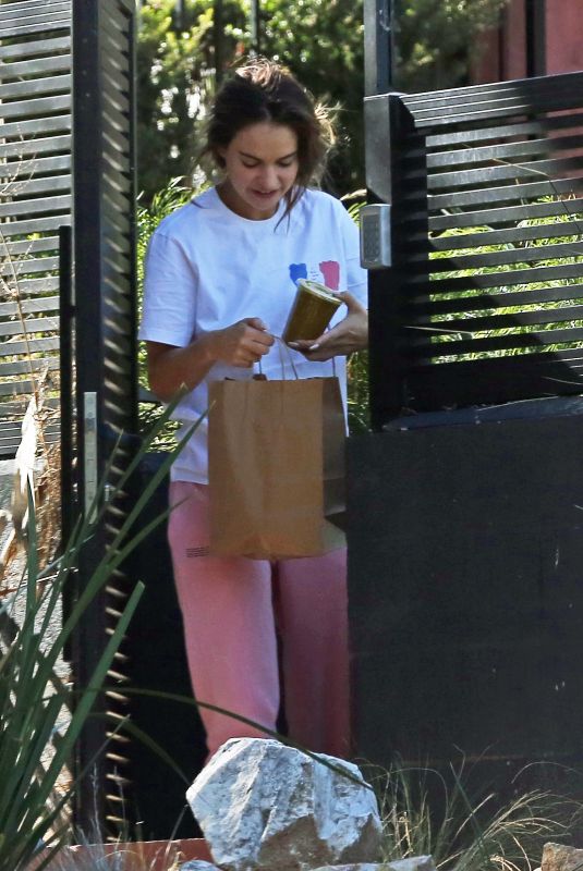 LILY JAMES Has Food Delivered to Her Home in Los Angeles 02/02/2022