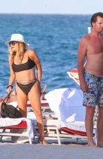 LUANN DE LESSEPS Out with Friends at a Beach in Miami 02/24/2022