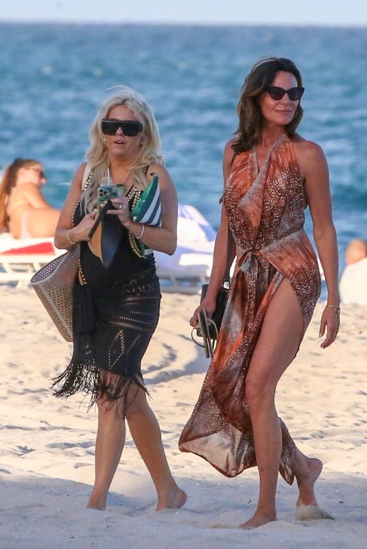 LUANN DE LESSEPS Out with Friends at a Beach in Miami 02/24/2022