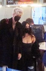 MEGAN FOX and Machine Gun Kelly at LAX Airport in Los Angeles 02/11/2022