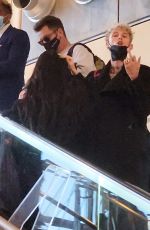 MEGAN FOX and Machine Gun Kelly at LAX Airport in Los Angeles 02/11/2022