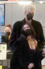 MEGAN FOX and Machine Gun Kelly at LAX Airport in Los Angeles 02/11/2022