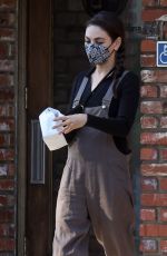 MILA KUNIS Leave Buds & Roses Cannabis Store in Los Angeles 02/05/2022