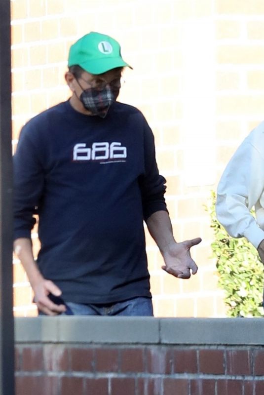 MILA KUNIS Out with Her Father-in-law Larry Kutcher in Los Angeles 02/02/2022