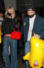 NICOLA PELTZ and Brooklyn Beckham at Craig