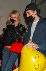 NICOLA PELTZ and Brooklyn Beckham at Craig