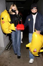 NICOLA PELTZ and Brooklyn Beckham at Craig