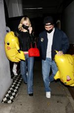 NICOLA PELTZ and Brooklyn Beckham at Craig