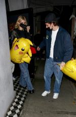 NICOLA PELTZ and Brooklyn Beckham at Craig